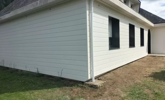 Pose d'un bardage PVC à Guémené-Penfao, Nantes, BS Charpente Bois